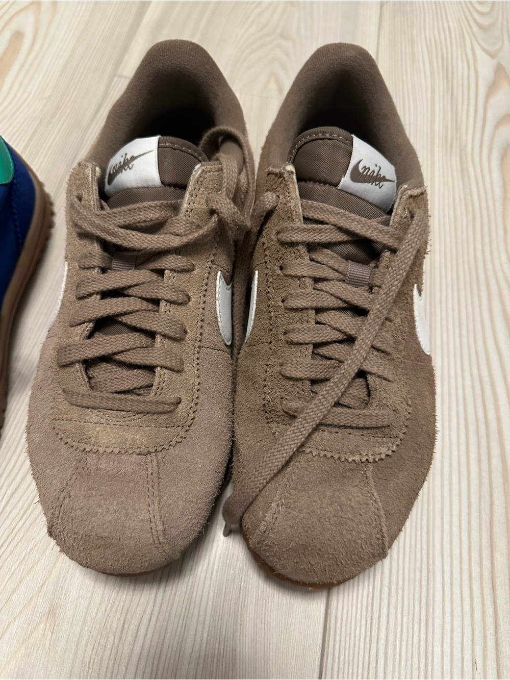 Nike Women’s Brown Suede Low-Top Sneakers with White Swoosh